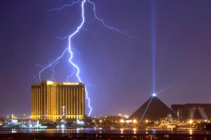 Lightning bolts strike over casinos on the south end of the Strip on July 17, 2006. Thunderstorms are fairly common during the summer months in Las Vegas.