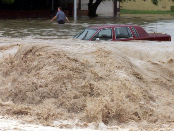 The floodwater began raging July 8, 1999. The storm left ...