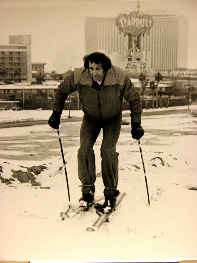 Near the Strip, a skier enjoys one of the valley's few snows. A winter storm dumped 7.4 inches of snow on the valley floor on January 31, 1979.  The next day, during his show at the Aladdin Hotel, comedian Gabe Kaplan quipped "Las Vegas has always been my favorite ski resort."