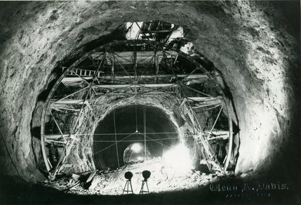 Diversion Tunnel No. 3 on the Arizona Side of Hoover Dam is shown under construction. The Hoover Dam sits in between Nevada and Arizona and divides the Colorado River. The project is built to help keep silt and sediment out of the Colorado River, and functions as a power plant as well as a dam. The reservoir behind the dam creates Lake Mead.