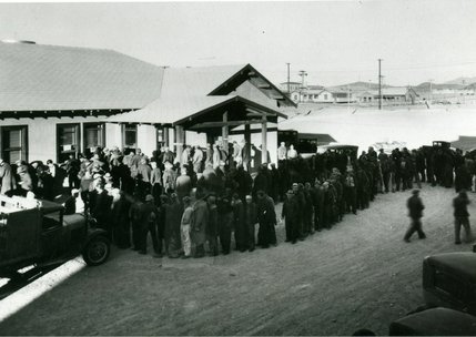 A picture shows the swing shift at the Hoover Dam lined up at the paymaster's window on Jan. 25, 1932. Men working on the dam were paid on the 10th and 25th of each month. Each worker earns about 50 cents an hour during the Great Depression. 