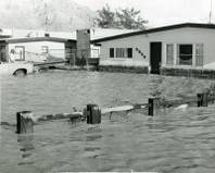 It is somewhat rare for flooding to occur in newer residential areas thanks to required flood planning and design.  At the time of this August 13, 1979 photograph, with a population just over a half-million, few considered flooding a major economic threat.