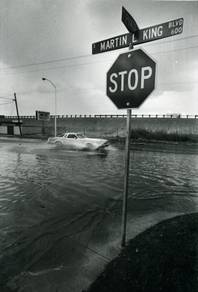The rain began to come down harder Aug. 18, 1989, causing the streets to flood on Martin Luther King Boulevard. The water started to rise to the point that the sidewalks were unable to be seen.