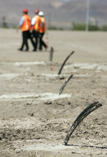 HENDERSON -- Aug. 29, 2006 -- Pipes for a geothermal heat exchanger stick out of the ground at Burkholder Middle School in Henderson.  Water from the heating and air conditioning system at the school will be circulated through pipes in 300 individual holes drilled to a depth of 285 feet to cool the water in the system. When the school building is completed it should realize significant energy savings over a comparably designed building.