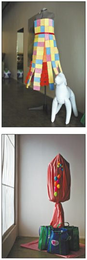 A dress made of sponges, top, is one of Barcus-Slonina's artworks. A portion of the Easter egg dress hangs on a stand.