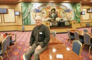 The wall behind Arizona Charlie's Decatur General Manager Ron Lurie hides a stage that soon will reemerge. The Palace Grand Showroom hosted many young and new artists on their way to fame.