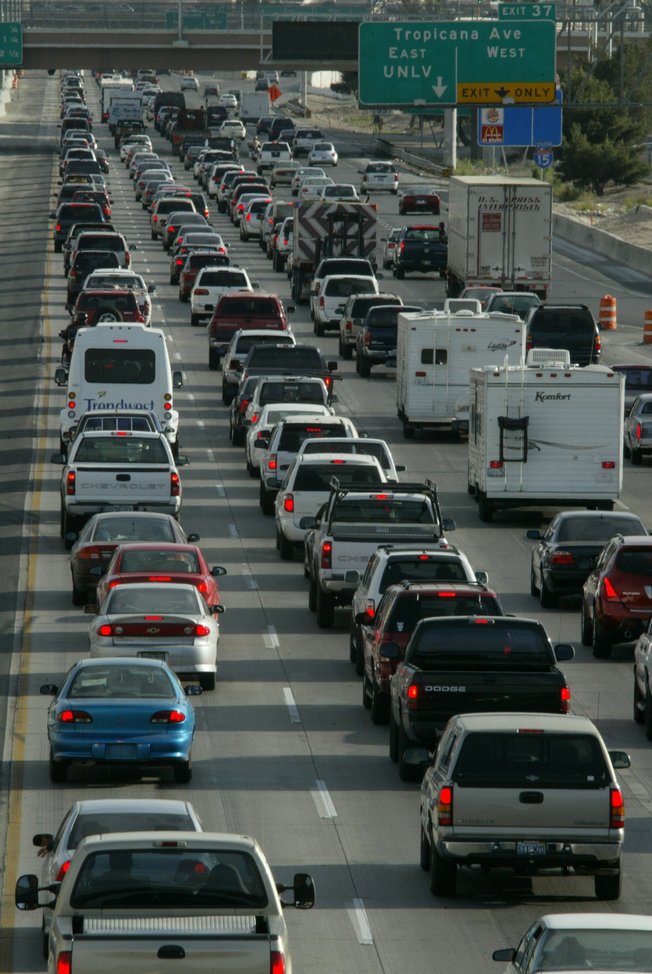 Motorists navigate rush hour traffic on Interstate 15 in Clark County. Rep. Jon Porter, who opposed tougher fuel efficiency standards two years ago, more recently has taken the position that Congress should act against global warming.