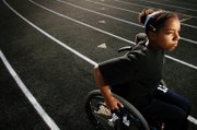 Kiya Smith, 13, will compete in swimming at the International Wheelchair and Amputee Junior World Championships at Rutgers University in July.
