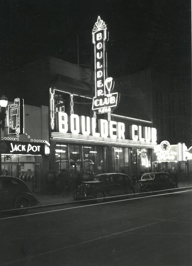 The lights of the Boulder club light up the night, January 21, 1942. The Boulder Club had the first electric sign in town. It was installed in 1934 by Young Electric Sign Company (YESCO), starting a trend that still characterizes "Glitter Gulch". 