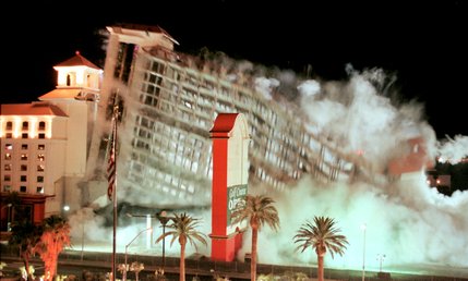 The Desert Inn's 15-story, 300-room Augusta tower crumbles as it implodes about 2 a.m. as seen from the New Frontier hotel-casino Tuesday, October 23, 2001. 