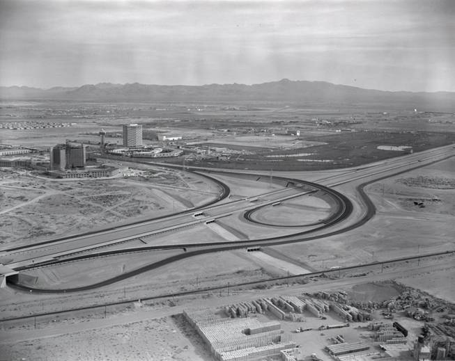 The Dunes and the under-construction Caesars Palace can be seen in this aerial photo of Las Vegas, 1962. The Dunes along with its 18-hole golf course would later become the Bellagio, while Caesars, although very different, is still with us.