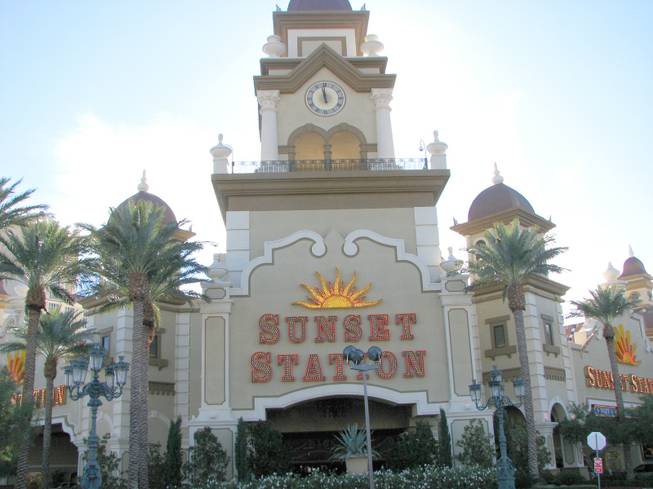 The entrance of Sunset Station as the sun goes down in Henderson. 