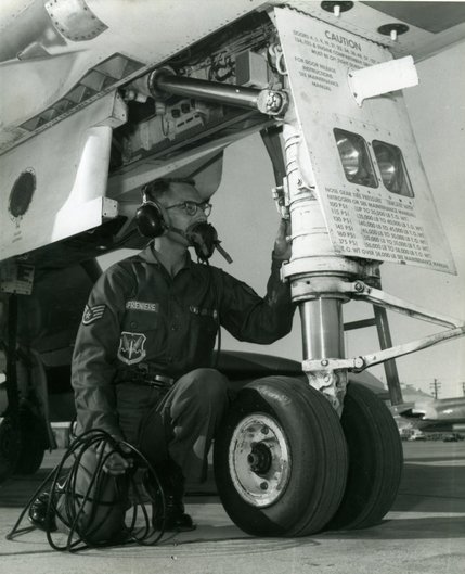 Nellis Air Force Base Staff Sgt. Andrew LaFreniere does a pre-flight check and talks to the pilot of the $2.5 million F-4C Phantom II jet aircraft. Sgt. LaFreniere won Airman of the Year in 1967.