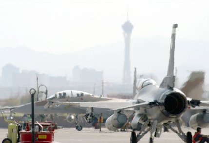 Exhaust from planes obscure the Stratosphere Tower as they leave to participate in the Red Flag air combat exercise Wednesday, Sept. 4, 2002 at Nellis Air Force Base. Red Flag is a two-week aerial war simulation exercise with more than 100 aircrafts from six countries participating. Nellis hosts four Red Flag exercises throughout the year.
