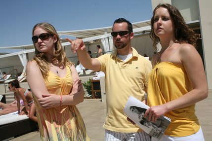 UNLV Nightclub Management students, from left, Lauren Bergher, Ryan Shephard and Cheryl Martin, discuss the progress of their semester-end project, a pool party at MGM Grand's Wet Republic. 