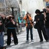 Students take photos for Protz's class during their last outing of the semester, May 1. Their work is posted on a blog and will be published in a book to be sold online. Protz hopes to continue the class each spring.