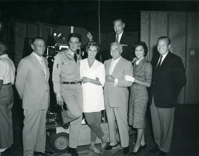 Left to right: Moe Dalitz, Elvis Presley, Juliet Prowse, Wilbur and Tom Clark, Cecil Simmons. Joe Franks, pose on the set of "G.I. Blues" in Hollywood in 1960.