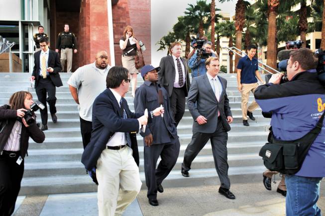 Adam "Pacman" Jones, center, leaves the Clark County Regional Justice Center in December 2007 in connection with a shooting incident at the Minxx strip club that left a man paralyzed. 
