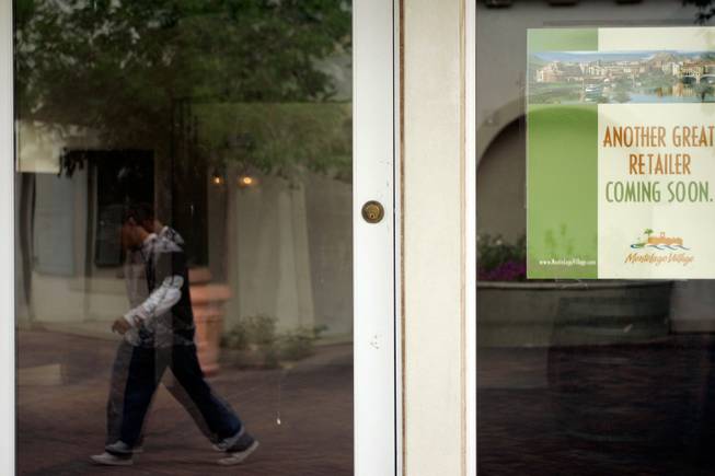 A sign indicates a vacant shop at the upscale MonteLago Village at Lake Las Vegas on Friday.