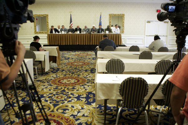 Joe Standley, center, president of the District Council of Iron ...