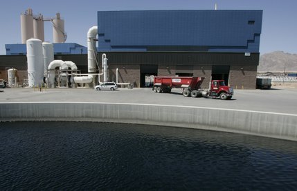 A truck laden with compressed waste leaves the Clark County Water Reclamation District's solids de-watering facility on its way to a landfill. 