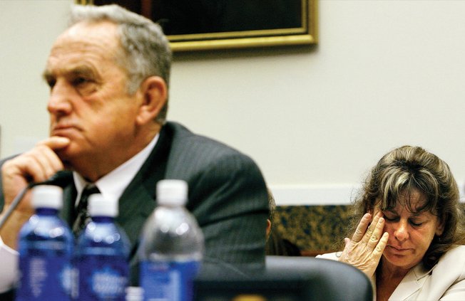 
Monique Cole, sister of late Las Vegas ironworker Harold Billingsley, wipes tears from her eyes as her husband, George Cole, listens Tuesday during the hearing on Capitol Hill. 