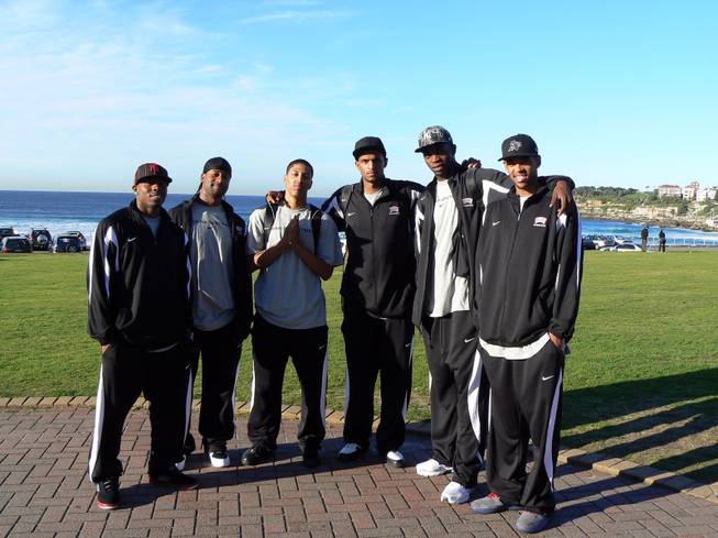 Members of the UNLV men's basketball team pose at Bondi Beach during their tour of Australia.