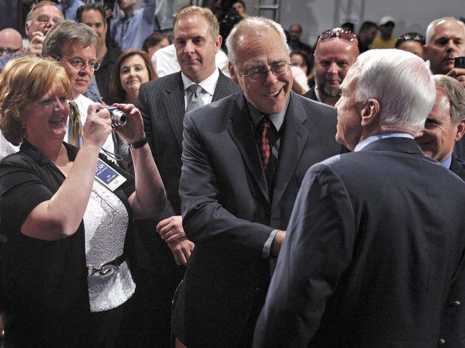 A supporter snaps a photo of John McCain after the senator's speech Wednesday at UNLV. McCain issued a challenge to automakers to come up with a 