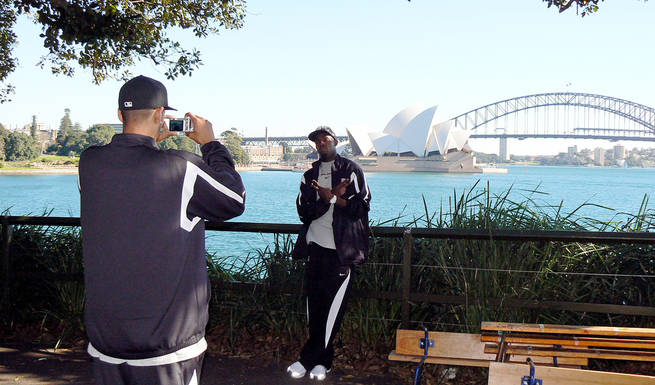 UNLV guard René Rougeau takes a photo of teammate Beas Hamga during the team's tour of Australia.