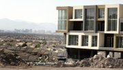 Slade Development, which had begun building Vantage Lofts at Paseo Verde Parkway and Gibson Road, has abandoned the project. The first phase is boarded up, and phone lines have been disconnected.