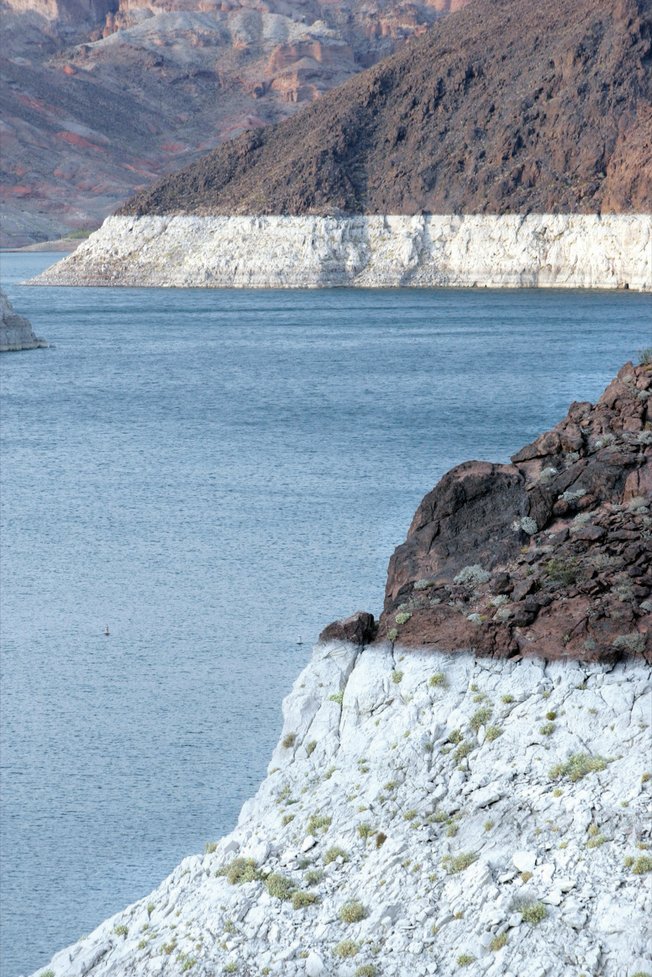 
Near the Hoover Dam, the difference in the color of the rocks shows how high the water level in Lake Mead has been. Drought on the Colorado River, combined with increased water use in booming Las Vegas, has reduced the reserves and has Las Vegas Valley water managers searching for options. 