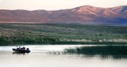 
Fishermen enjoy an outing on Comins Lake, about 10 miles south of Ely in White Pine County. Opponents of Las Vegas' ground water pumping plan fear lakes such as Comins could ultimately dry up.