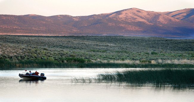 
Fishermen enjoy an outing on Comins Lake, about 10 miles south of Ely in White Pine County. Opponents of Las Vegas' ground water pumping plan fear lakes such as Comins could ultimately dry up.