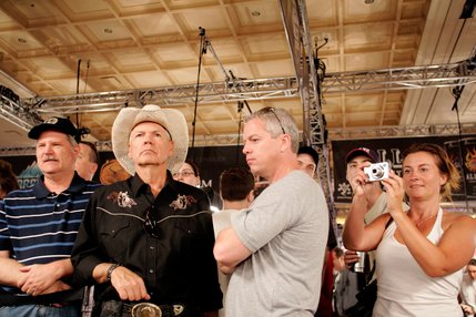 From left, David Hindmarsh of Fort Smith, Ark., Lloyd Mashore of Palm Desert, Calif., John Loonstyn of Philadelphia and Tina Tripsen of Denmark watch the action during the first day of the World Championship No-Limit Texas Hold'em tournament. 