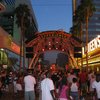 Musicians keep the crowd entertained before Don McLean's "American Pie" is premiered on the Fremont Street Experience's Viva Vision.