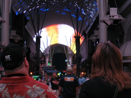A couple stand and take in the patriotic display.