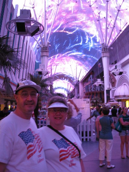 Ray and Debra Bolin, of Botkins, Ohio, show their true colors on Fremont Street.