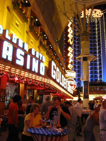 Ed and Lynn Himebauch, of Fayetteville, NC, enjoy a late supper at a remarkably American table along Fremont Street.
