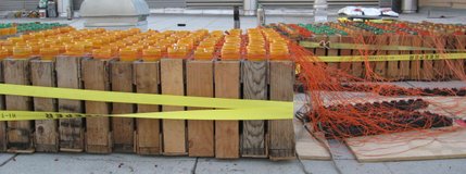 Dozens of 2 1/2 and 3-inch shells are bound together, waiting on the roof of Henderson City Hall.