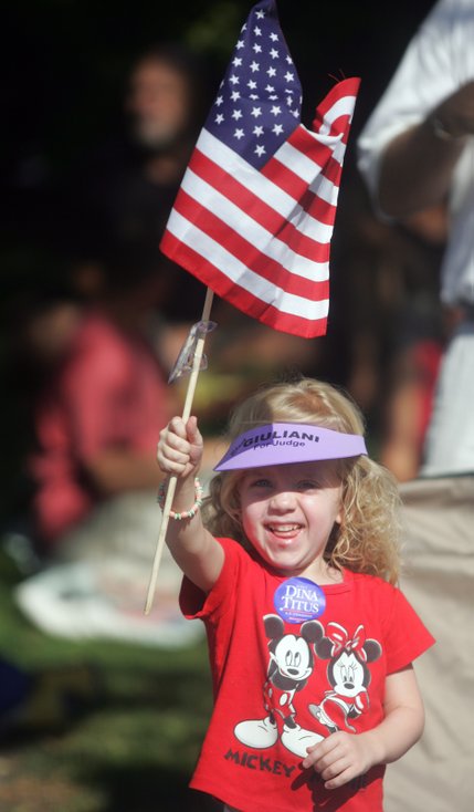 Lucia Hakans, 4, waves her flag with excitement during the Summerlin Patriotic Parade on July 4. 