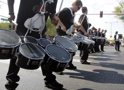 Members of the Vegas Vanguard percussion ensemble drum out a beat during the Summerlin Patriotic Parade on July 4.