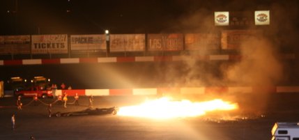 A Jet Car ignites a defunct hearse at the Las Vegas Motor Speedway Thursday.