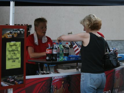 To beat the heat, a spectator buys a brew at the Las Vegas Motor Speedway.