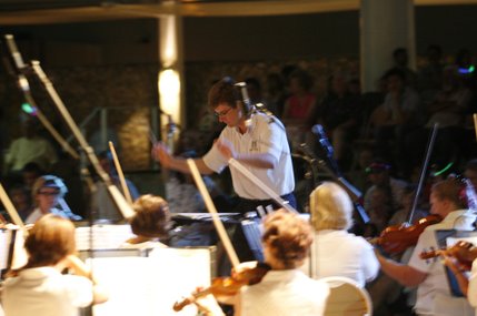 Henderson Symphony Orchestra Conductor Taras Krysa center conducts the band.