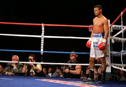 WBO junior welterweight champion Ricardo Torres waits in a neutral corner after knocking down Kendall Holt for the second time in the first round during their title fight at Planet Hollywood.