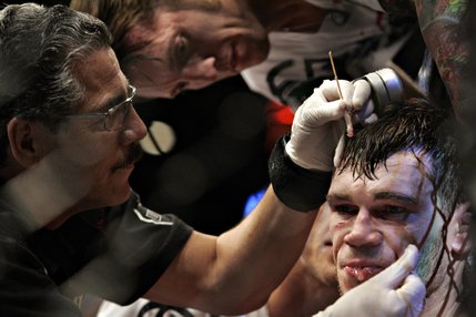 Forrest Griffin is tended to between rounds of his light heavyweight title fight in UFC 86 at Mandalay Bay on Saturday night.
