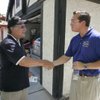 Sean Fellows, right, a Republican candidate for state Assembly, talks with retired teacher Ralph Kno