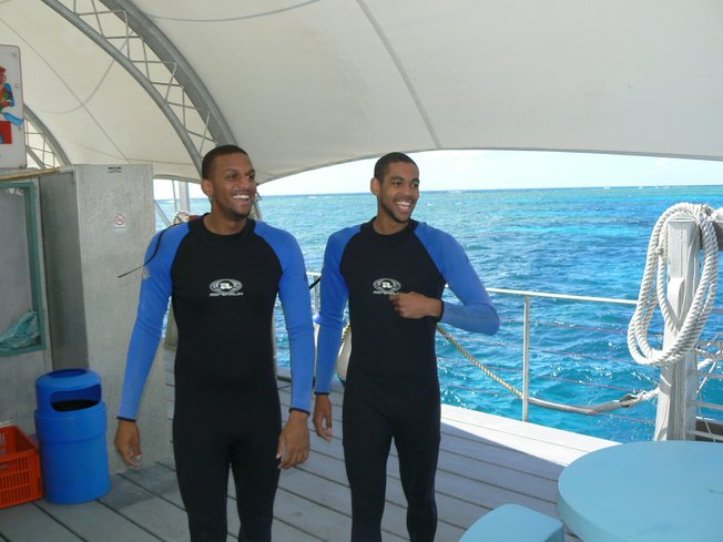 UNLV basketball players Matt Shaw, left, and René Rougeau prepare to plunge into the Coral Reef during the team's trip last summer to Australia. Shaw tore the ACL in his right knee just before the trip, and couldn't have surgery until he returned, as he waited for the swelling to go down.
