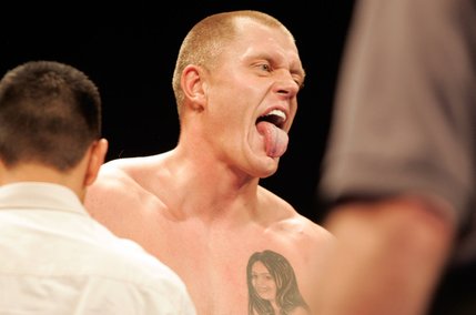 Kaspars Kambala celebrates a win against Ron Weaver after a heavyweight boxing match at the Las Vegas Hilton.