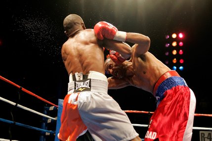 Kevin Kelley, left, and Jaime Palma fight during a lightweight boxing match at the Las Vegas Hilton.